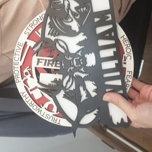 Durable plastic picture frame decorates the desk